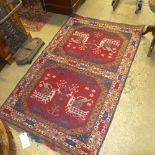 A hand knotted Persian rug the oval grou