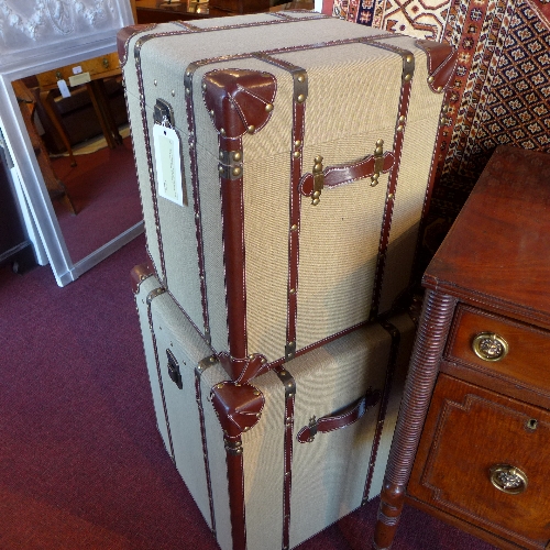 A linen and leather bound cube form storage trunk and a smaller similar (2) W 40-50 cm