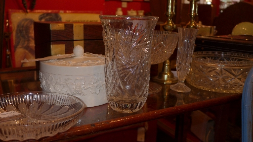 A Wedgwood dish together with some crystal glass pieces and a pair of brass candle sticks