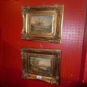 A pair of miniature paintings on board landscape scenes in gilt frames