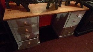 A painted distressed finish pine dressing table fitted eight drawers W 138 x D 46 x H 76 cm