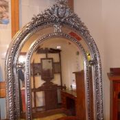 A French style pier mirror the arched plate with divisional border in silvered framed   W 104 x H