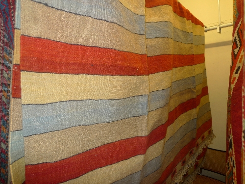 A fine South West Persian Qashgai Kilim with all over repeating multi colour stripes L 243 cm x W