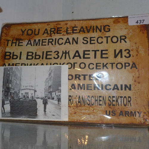 A rare Checkpoint Charlie metal sign with original postcard for the checkpoint