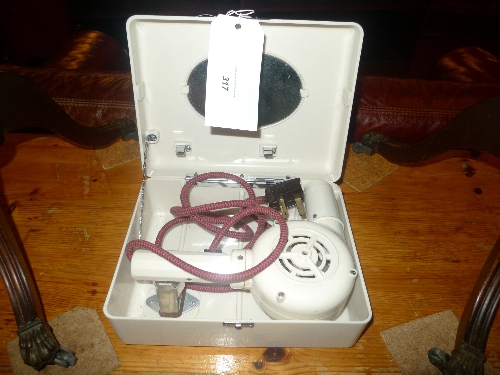 An Ormond vintage bakelite hair dryer in original box