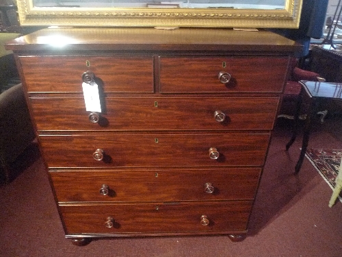 A C19th mahogany chest fitted two short above four long drawers with moulded knob handles