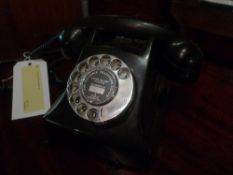 A black bakelite telephone