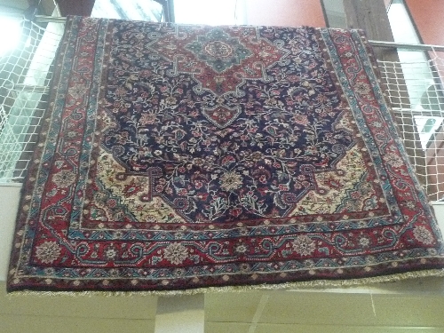 A fine North West Persia Bidjar carpet central pole medallion all over floral motifs with four