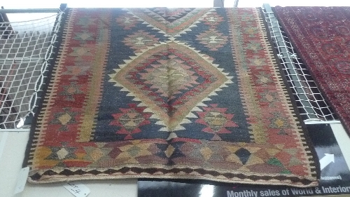 A fine old North West Persian Bidjar Kilim with multi pole geometrical medallion guarded by