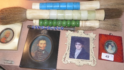 A collection of four miniatures