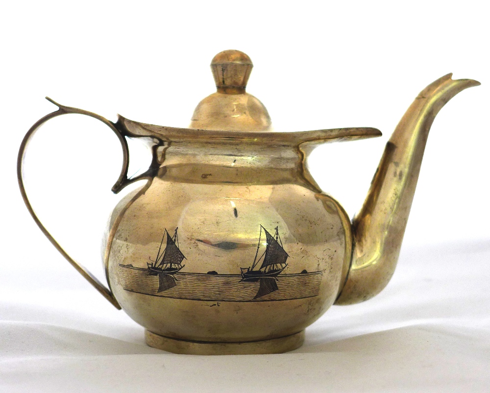 An Iraqi niello silver tea pot decorated with palm trees on river scene with a boat in the