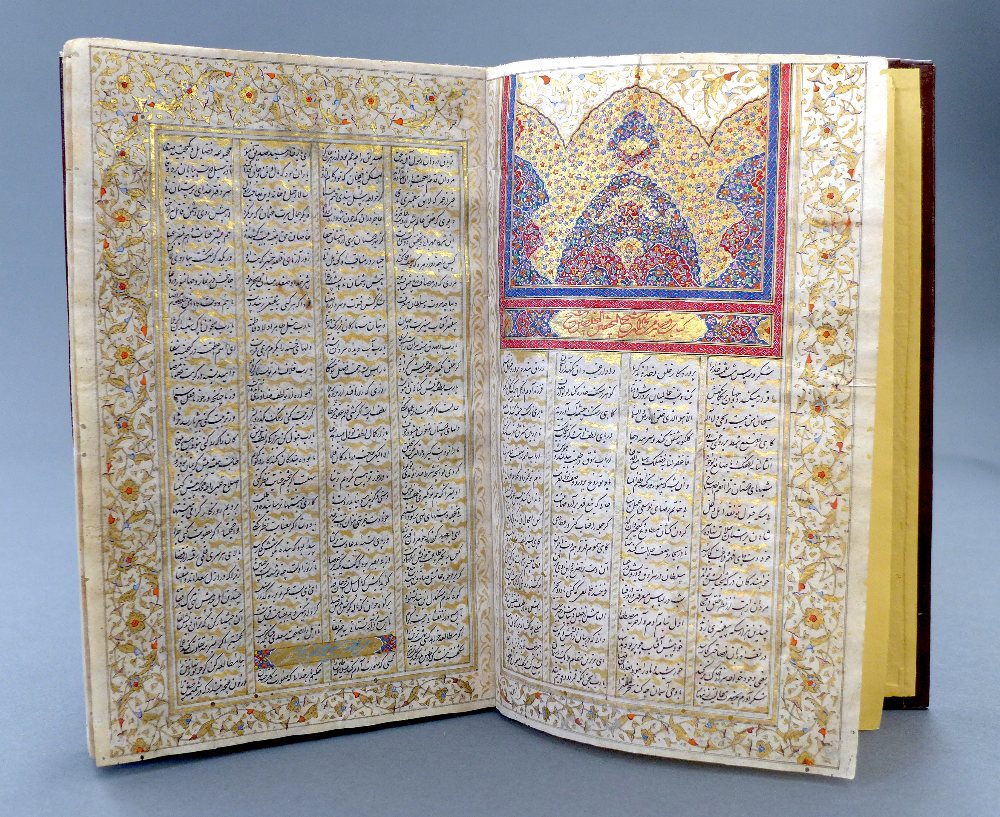 A  Qajar book of poems from Shiraz , Divan with poems by Hafaz.  The leaves with gilt calligraphic