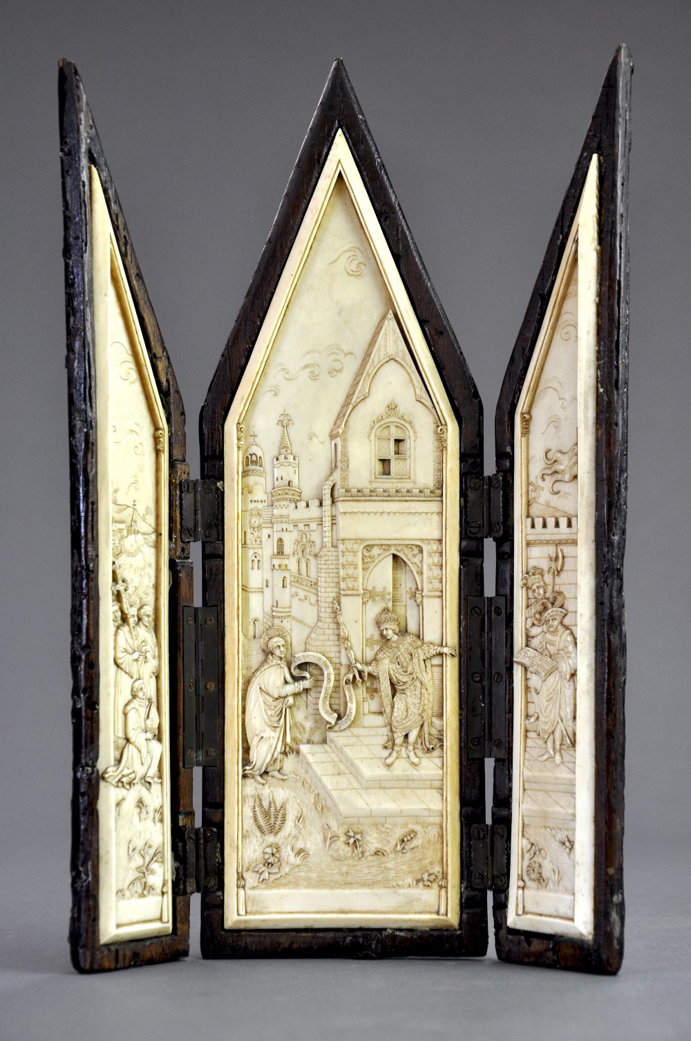 A C19th English carved ivory triptych based on the mural painting by Lambert Barnard (1485 - 1567)