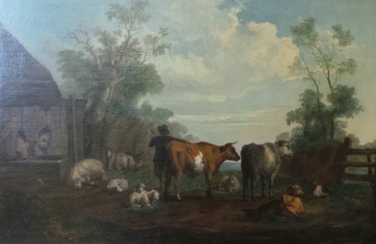 An C18th British School oil on canvas study of cattle in a farmyard setting with sheep and farmer