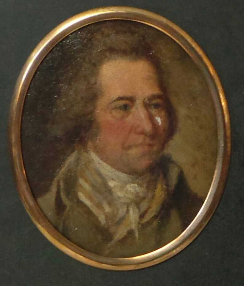 An C18th miniature oil portrait of a gentleman with inscription verso 9.5cm x 11cm