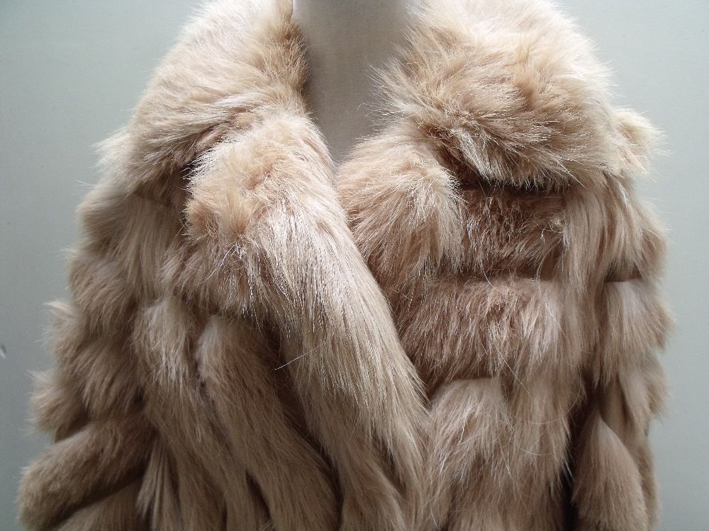 A STYLISH FULL LENGTH DIAGONAL PATTERN VINTAGE FUR COAT, the panels of possible wolf / coyote fur