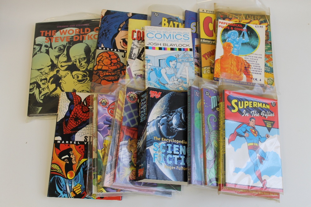 A COLLECTION OF COMIC REFERENCE BOOKS including Steve Ditko and Jack Kirby interest, Superman,