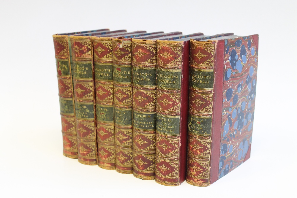 NOVELS OF GEORGE ELIOT, eight volumes in seven, half red leather, marbled boards, late 19th