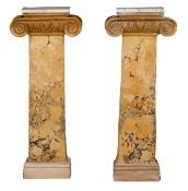 A pair Ionic giltwood and scagliola columns, early 20th century, with variagated marble on giltwood