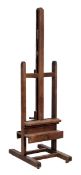 An oak large double sided artist`s studio easel, late 19th early 20th century, with two adjustable