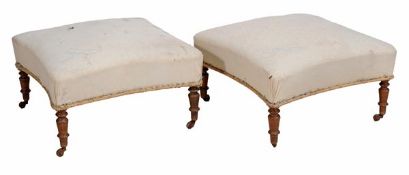 A pair of walnut framed foot stools, 19th century, set on turned legs - both in need of