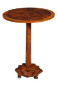 A mixed wood circular occasional table in Islamic style, 20th century, the burr walnut inset top