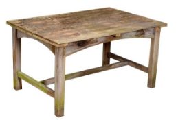 a hardwood garden table, 20th century, with plank top above arched frieze and square supports