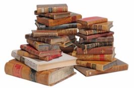 A collection of antique and later books including leather bound volumes