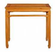 A Chinese pine altar table, 20th century, the rectangular top above a moulded and pierced frieze,