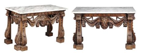 A pair of George II style carved pine console tables, 20th century, each topped with variagated