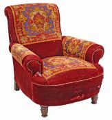 A Victorian velvet and turkey carpet upholstered armchair, late 19th century, the rectangular back