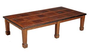 An oak and mixed hardwood coffee table, late 19th early 20th century, the top with hardwood edges