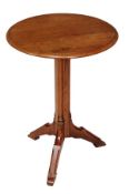 A Howard & Sons Gothic Revival pitch pine circular occasional table, circa 1880, bearing a paper