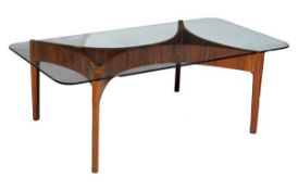 A rosewood and glass topped coffee table, second half 20th century, the glass top above x-framed