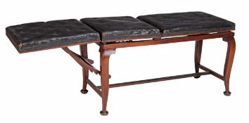 An Edwardian mahogany massage table by W.H. Bailey & Son, circa. 1905, with three adjustable