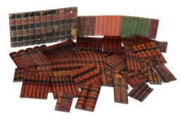 A large collection of false book bindings, 20th century construction, to include paper and cast