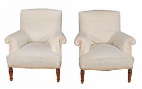 A pair of walnut and upholstered armchairs, circa 1860, each tapering rectangular back above