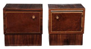 Two similar rosewood and amboyna bedside cupboards, mid 20th century, with amboyna panel doors and