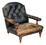 A late Victorian leather and mahogany framed library armchair, late 19th century, with button