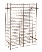 A pair of Continental wrought iron wine bottle racks, early 20th century, of rectangular form, each