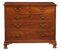 A George III mahogany chest of drawers circa 1780 with an inlaid moulded and crossbanded top, two