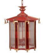 A parcel gilt and japanned metal and glazed hall lantern in Regency style, of recent manufacture,