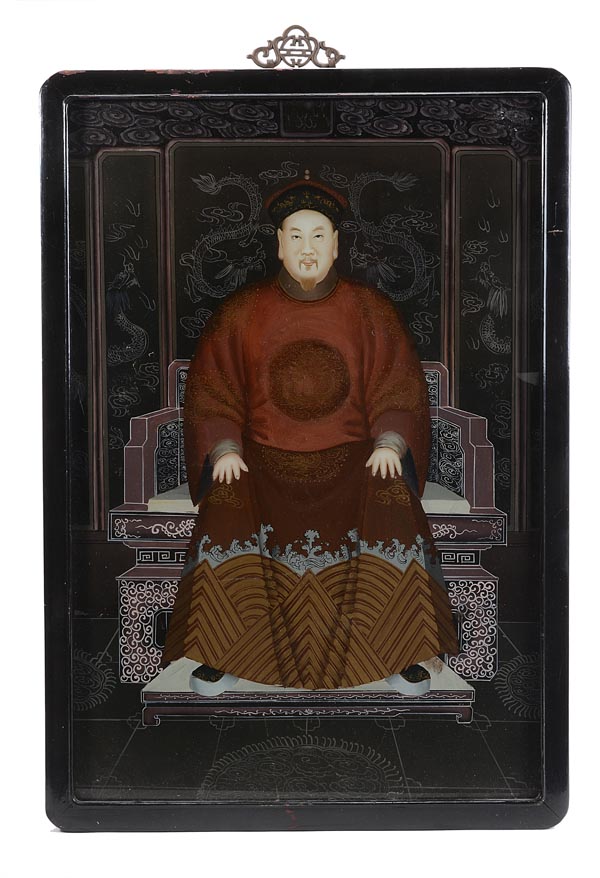 A Chinese reverse glass painting of an emperor, seated on a throne behind a dragon screen, 80cm