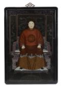 A Chinese reverse glass painting of an emperor, seated on a throne behind a dragon screen, 80cm