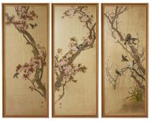 Three Chinese silk panels painted with branches of flowering prunus blossoms and birds, framed and