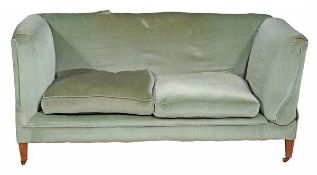 A sofa upholstered and walnut framed drop end sofa, circa 1900, one rear leg stamped HOWARD & SONS