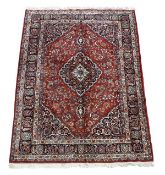 An Indian Kashan carpet, approximately 205 x 298cm