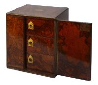 A mid Victorian burr walnut and brass banded table cabinet, circa 1860, of rectangular form, the