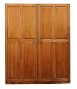 A French oak Notaire`s cabinet, circa 1930, with moulded quadruple panel doors enclosing an