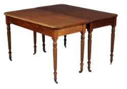 A Regency mahogany dining table, circa 1815, in the manner of Gillows of Lancaster, the rectangular